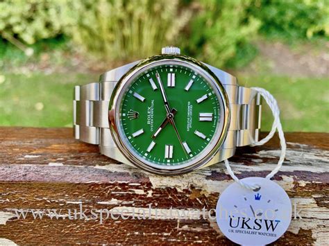 rolex oyster perpetual green dial 41mm|rolex oyster perpetual 41mm 124300.